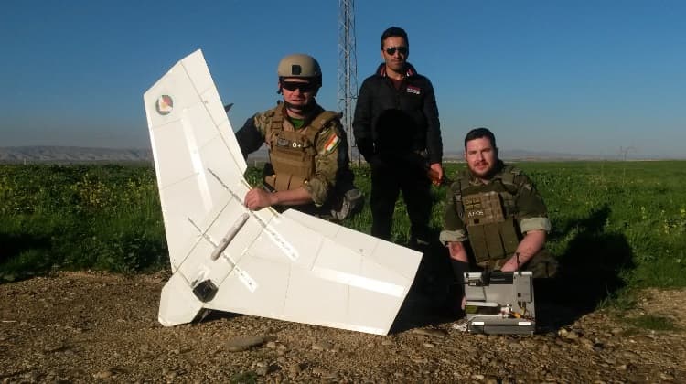 three amigos with drone